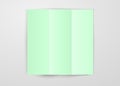 Three times folded light green paper sheet placed on white background. Square card template design vector isolated with shadow