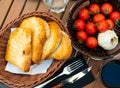 Pa amb tomaquet, traditional Catalan food, served on wooden table.