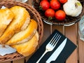 Pa amb tomaquet, traditional Catalan food, served on wooden table.