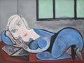 1939 Reclining woman reading by Pablo Picasso