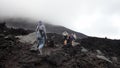 Pacaya, Guatemala - August 14, 2011: Hikers on their way up the active volcano Pacaya, close to Antigua, Guatemala, Central