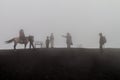 PACAYA, GUATEMALA - MAR 28, 2016: Tourists visiting the Pacaya volcano in the mist, Guatema