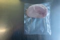 The pace of cooked ham in a plastic vacuum bag Royalty Free Stock Photo