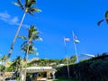 Pacific Club Oahu with American and Hawaiian Flags