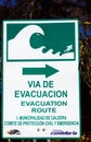 PACIFIC COAST, CHILE - DECEMBER 26. 2011: Close up of sign for evacuation route in case of tsunami Spanish language