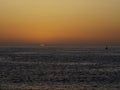 Pacific Coast Sunset with Sailboat Royalty Free Stock Photo