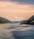 Pacific coast tugboat pulling barge, Principe Channel, British Columbia, Canada.