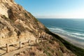 Pacific coastline with yellow sandstone cliffs before sunset time. Black`s Beach, San Diego Royalty Free Stock Photo