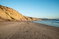 Pacific coastline with yellow sandstone cliffs before sunset time. Black`s Beach, San Diego Royalty Free Stock Photo