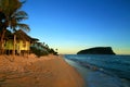 Pacific Island tropical sandy beach with traditional beach fales after sunset twilight, Lalomanu beach Samoa, Upolu, Pacific Ocean Royalty Free Stock Photo