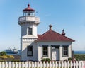 Mukilteo Lighthouse with Washington Ferry in Puget Sound Royalty Free Stock Photo