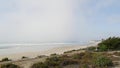 Pacific ocean beach. Vista point in Seagrove park. Del Mar, California USA. Fog misty haze weather