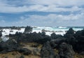 Pacific ocean breaks against lava rocks at Keanae Royalty Free Stock Photo