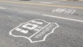 Pacific Coast Highway road marking on asphalt, historic route 101 sign in California, trip in USA. Royalty Free Stock Photo