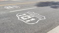 Pacific Coast Highway road marking on asphalt, historic route 101 sign in California, trip in USA. Royalty Free Stock Photo