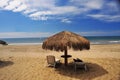 ocean tropical beaches handmade umbrellas with siilas without people in Mancora Peru