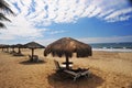 ocean tropical beaches handmade umbrellas with siilas without people in Mancora Peru