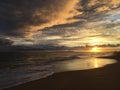 Pacific Ocean Waves at Beach in Kekaha during Sunset on Kauai Island in Hawaii. Royalty Free Stock Photo