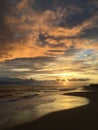 Pacific Ocean Waves at Beach in Kekaha during Sunset on Kauai Island in Hawaii. Royalty Free Stock Photo