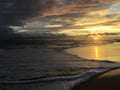 Pacific Ocean Waves at Beach in Kekaha during Sunset on Kauai Island in Hawaii. Royalty Free Stock Photo