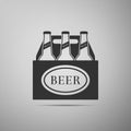 Pack of beer bottles icon isolated on grey background. Case crate beer box sign. Flat design. Vector Illustration. Royalty Free Stock Photo