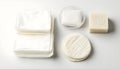 A pack of cotton pads and soap the right of the white on white background Royalty Free Stock Photo