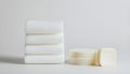 A pack of cotton pads and soap the right of the white on white background Royalty Free Stock Photo