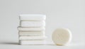 A pack of cotton pads and soap the right of the white on white background Royalty Free Stock Photo
