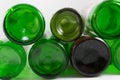 Pack of empty beer and wine green and brown glass bottom bottles, on a white background. Reuse, Eco-Friendly