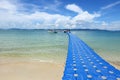 Pack Group of Blue Cubes Float on clear Ocean beautiful beach for tourist to walk from boat Royalty Free Stock Photo