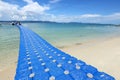 Pack Group of Blue Cubes Float on clear Ocean beautiful beach for tourist to walk from boat Royalty Free Stock Photo