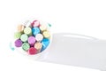 Pack of Jumbo Sidewalk Chalk, Assorted Colors in a Plastic Bucket on White Background with Shadow. Top View