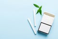 Pack of menthol cigarettes and fresh mint on colored table, Menthol cigarettes top view flat lay Royalty Free Stock Photo