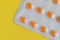 Pack of orange pills Royalty Free Stock Photo