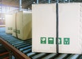 Package boxes sorting on conveyor belt