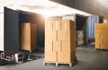 Package Boxes Stack on Wooden Pallets Loading into Container Trucks. Supplies Shipping. Freight Truck Logistic Transport. Royalty Free Stock Photo