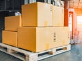 Package Boxes Stack on Wooden Pallets to Send to Customers. Warehouse Shipping. Supply Chain, Supplies Shipment. Royalty Free Stock Photo