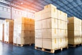 Package Boxes Stacked on Wooden Pallets in Warehouse. Cargo Supplies Warehouse Shipping. Shipment Boxes, Supply Chain.