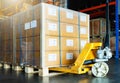 Package Boxes Wrapped Plastic Flim on Pallets with Hand Pallet Jack. Storage Warehouse. Supply Chain. Cargo Boxes Shipment. Royalty Free Stock Photo