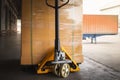 Package Boxes Wrapped Plastic Stacked on Pallets. Hand Pallet Truck. Forklift Loader. Distribution Supplies Warehouse Royalty Free Stock Photo