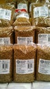 Package of buckwheat groats on supermarket shelf for sale. Grains. Retail industry. Grocery store. Shop. Healthy eating. Shopping