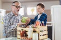 Package of fresh groceries to a stay-at-home father and his son.