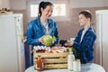 Package of fresh groceries to a stay-at-home mother and her son.