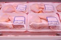 Packaged fresh chicken leg for sale in NTUC supermarket, displayed on shelves; pre packed meat