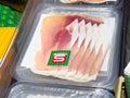 Packaged sliced ham in clear plastic tray on display Royalty Free Stock Photo