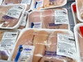 Packages of boneless skinless chicken breast Royalty Free Stock Photo