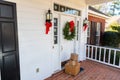 Packages on front porch of home during holiday season Royalty Free Stock Photo