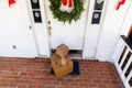 Packages on front porch of home during holiday season Royalty Free Stock Photo