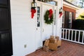 Packages on front porch of home during holiday season