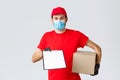 Packages and parcels delivery, covid-19 quarantine delivery, transfer orders. Friendly courier in red uniform, face mask Royalty Free Stock Photo